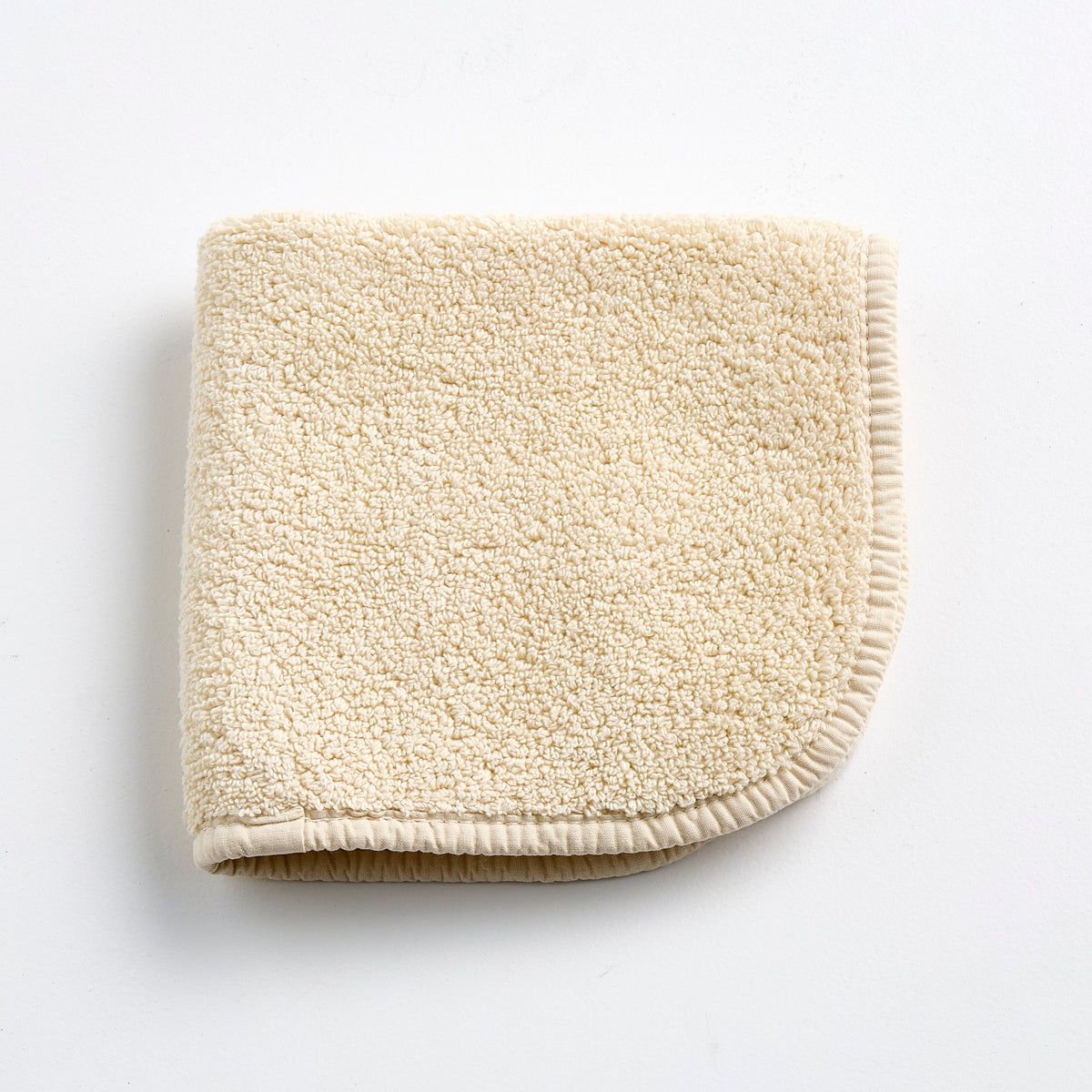 Gant de toilette en tissu éponge de coton