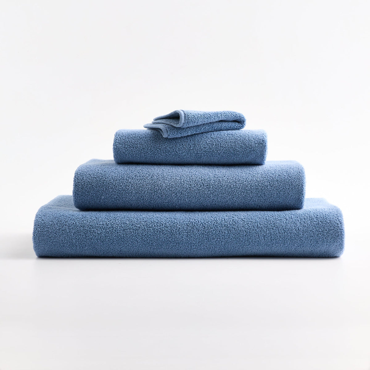 Gant de toilette en coton bleu denim
