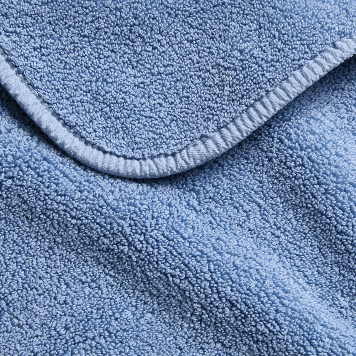 Gant de toilette en coton bleu denim