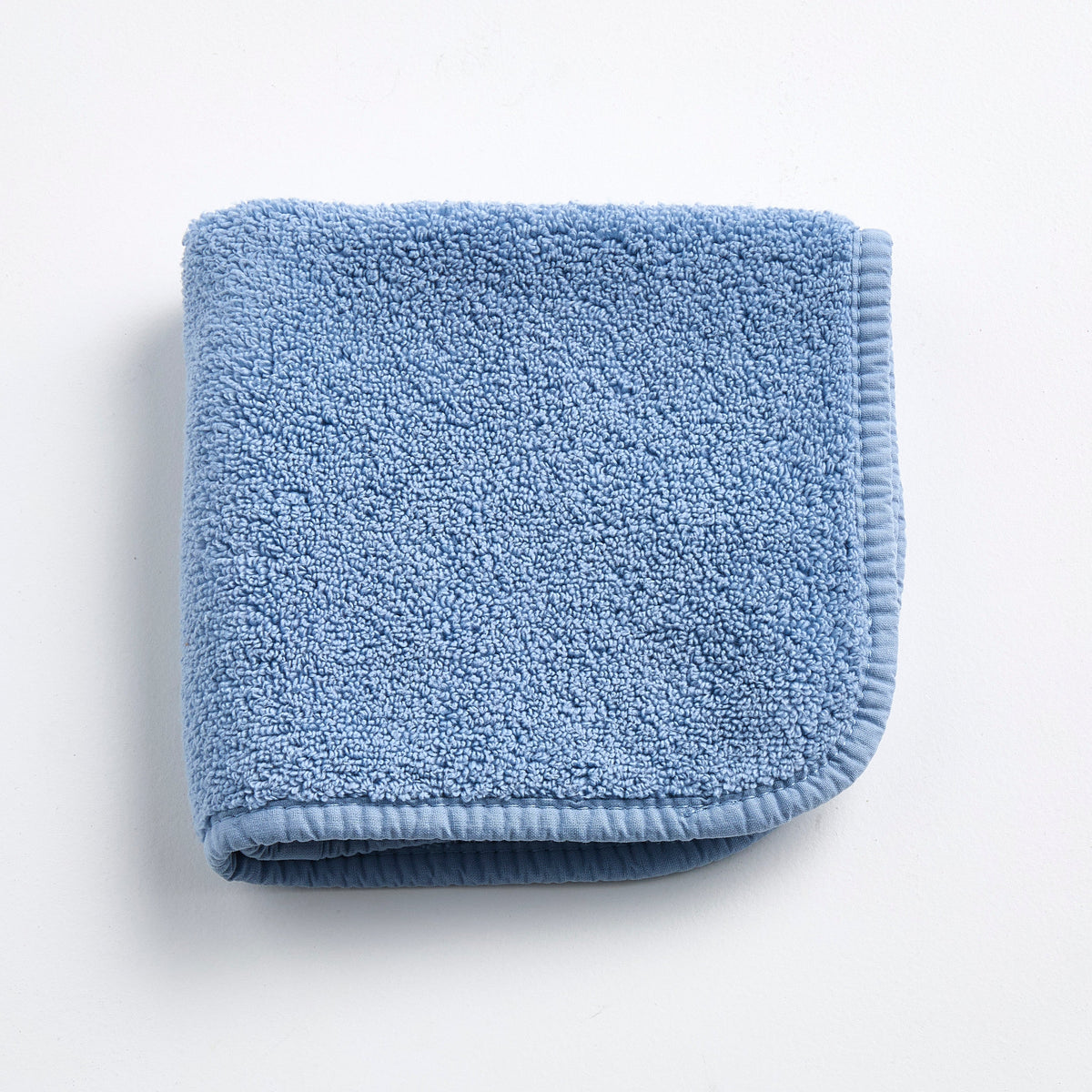 Gant de toilette en coton bleu denim