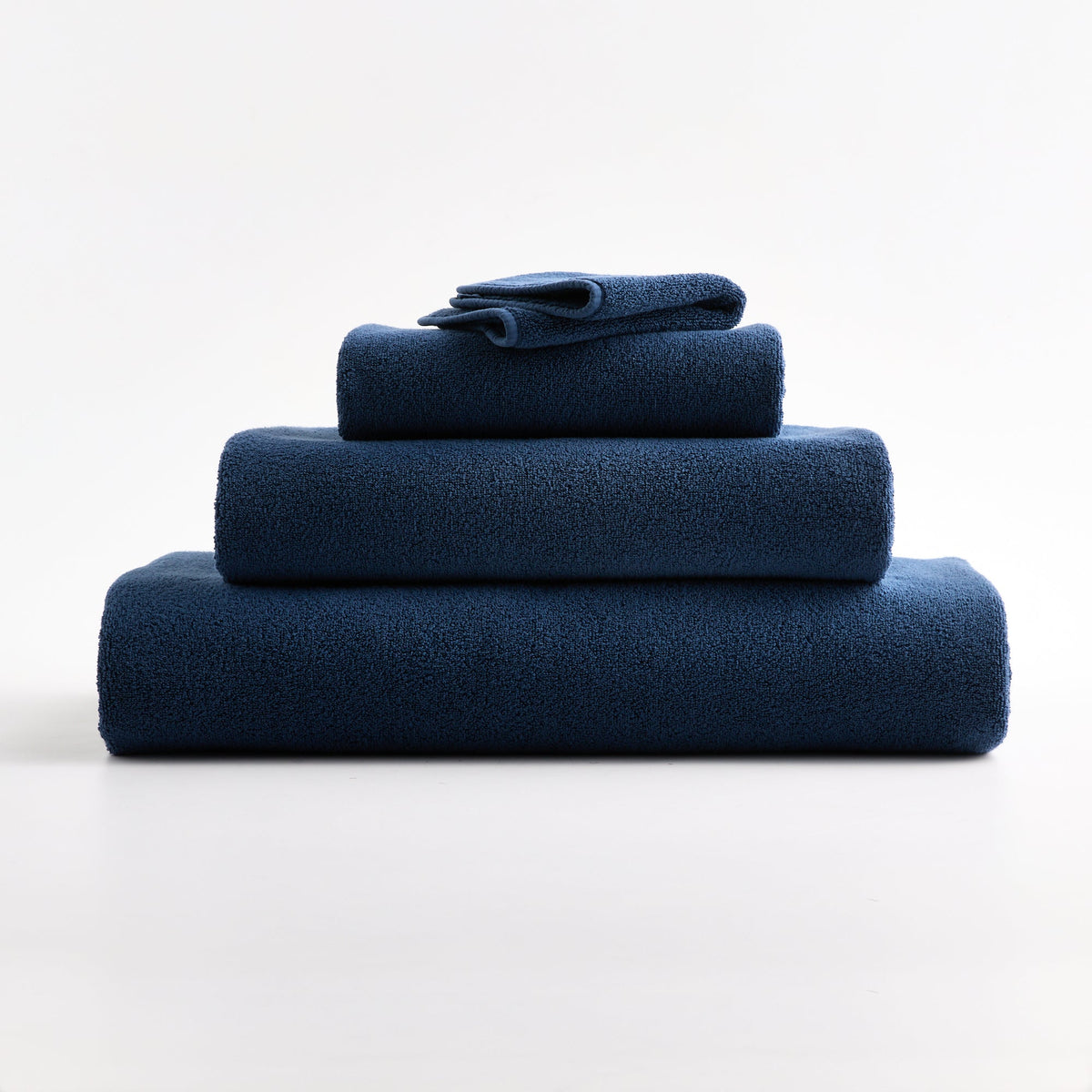 Gant de toilette en coton bleu indigo