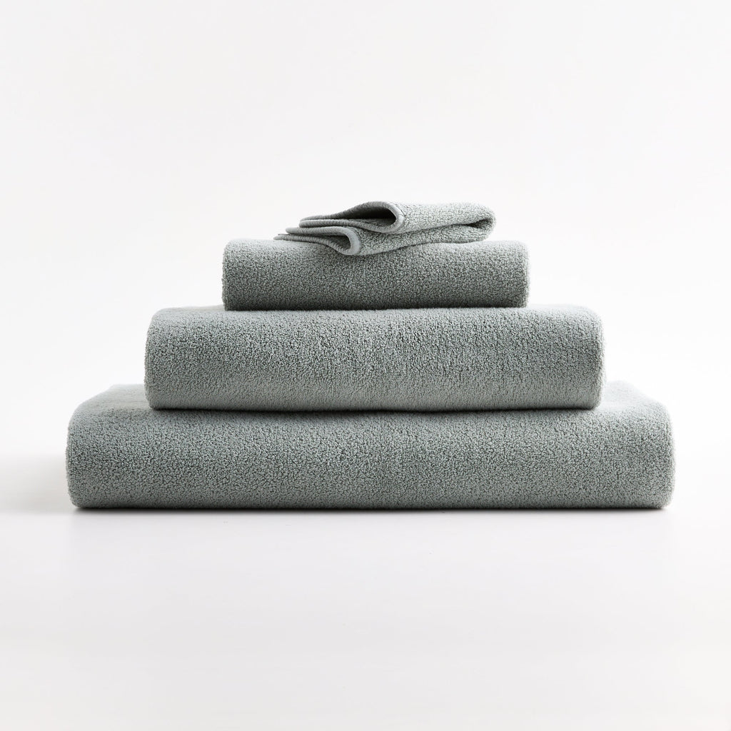 Manopola in cotone blu nebbia