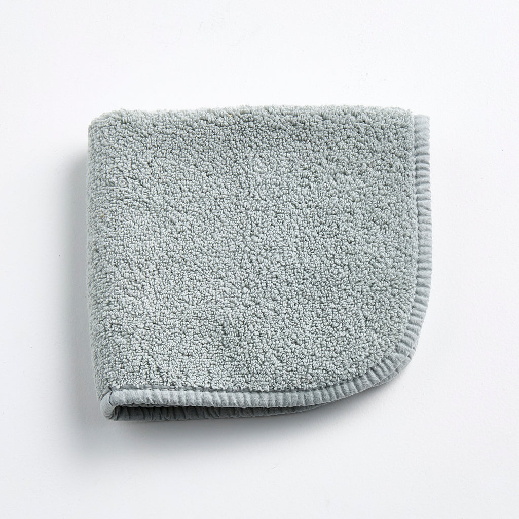 Manopola in cotone blu nebbia