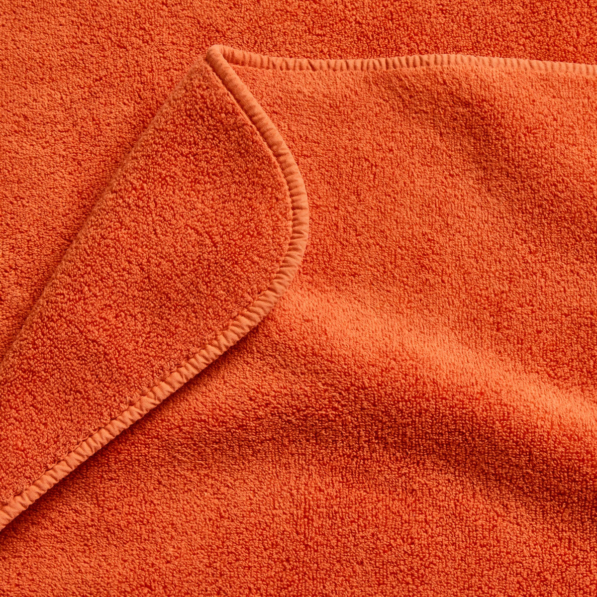 Serviette d'invité en coton orange citrouille