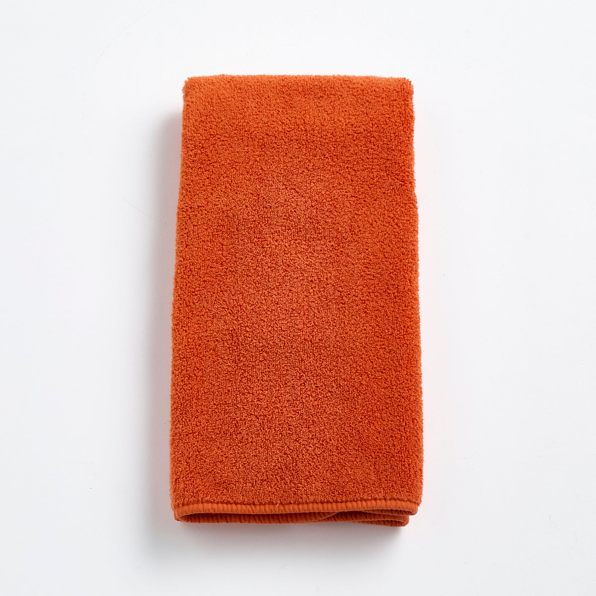 Serviette d'invité en coton orange citrouille