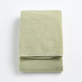 Serviette de bain en coton vert sauge