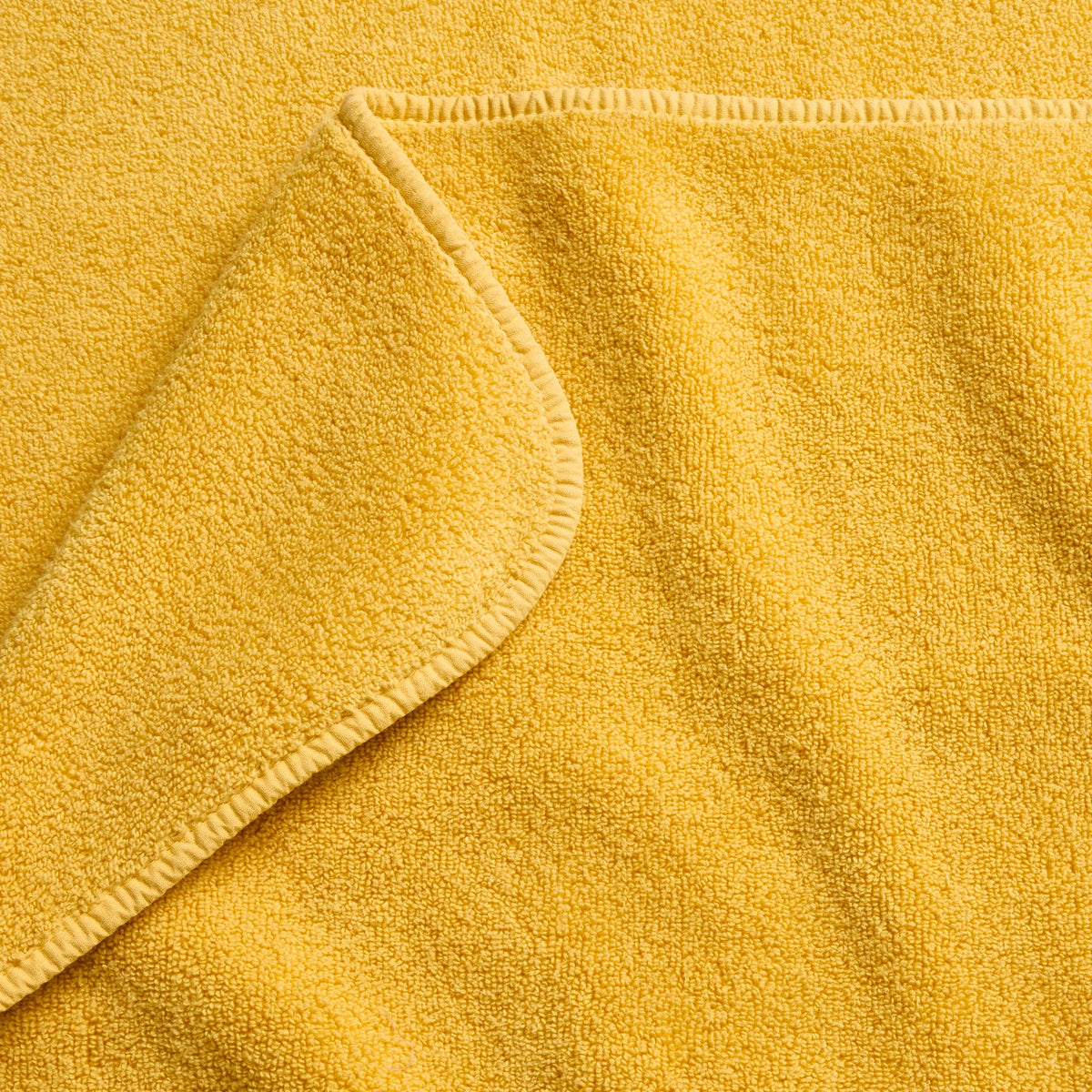 Serviette de bain en coton jaune