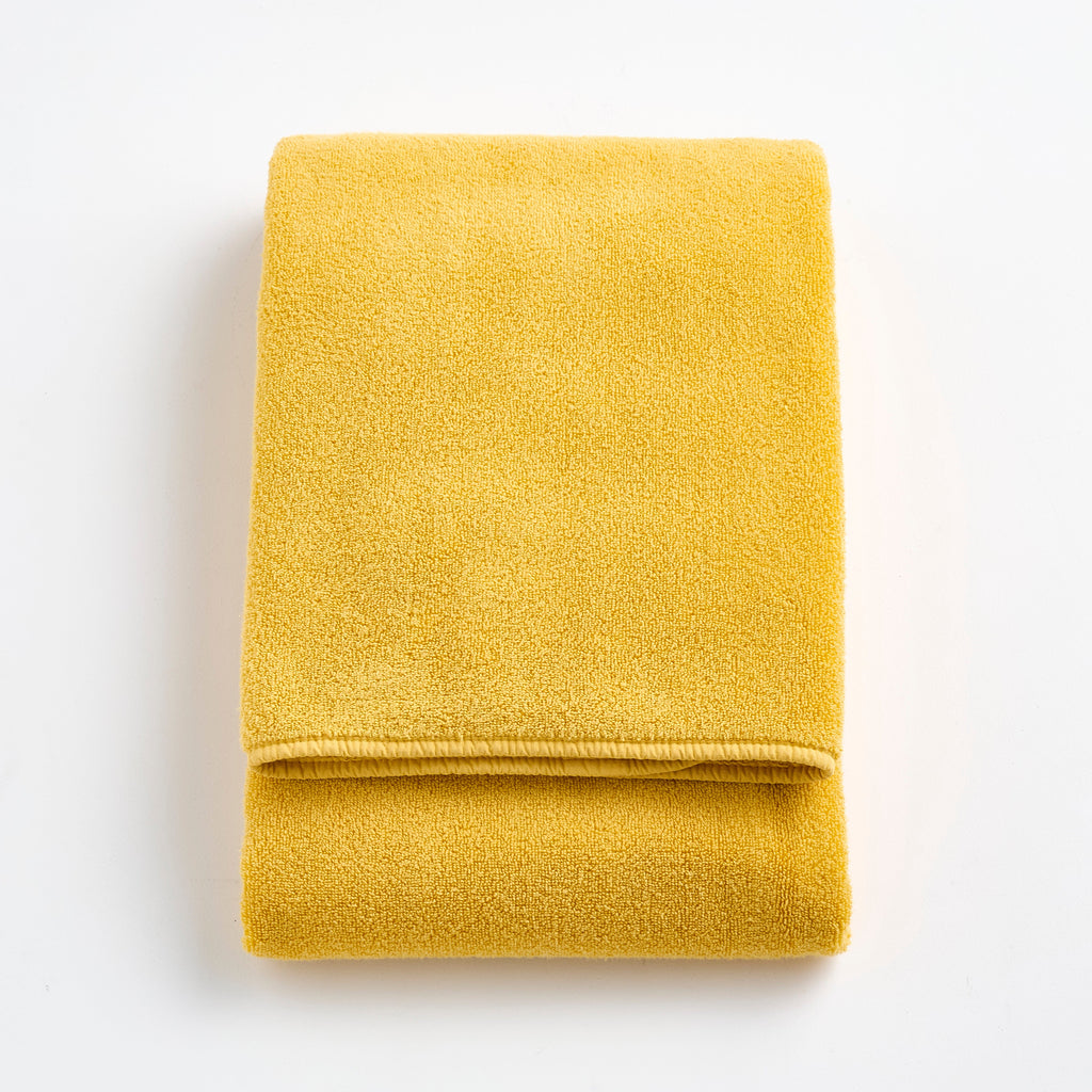 Gele katoenen badhanddoek