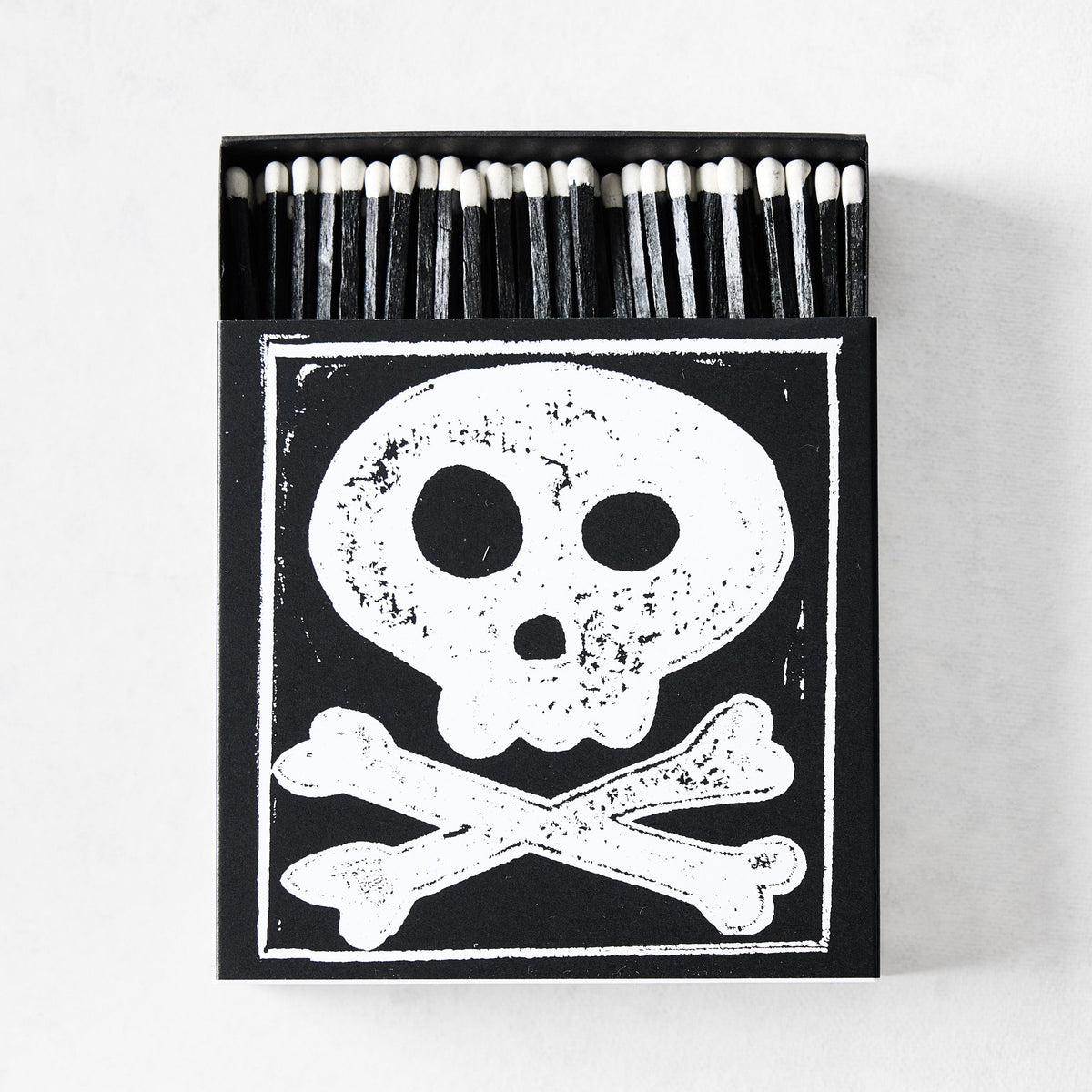 Allumettes Tête de mort et os croisés