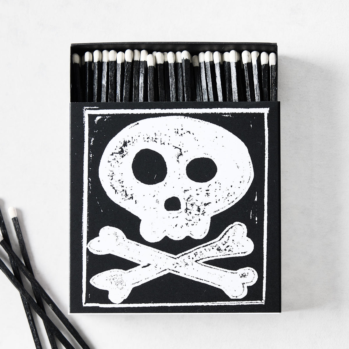 Allumettes Tête de mort et os croisés